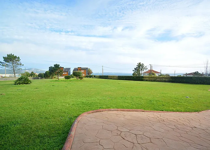 Con Jardin En Playa De Corrubedo דירה *